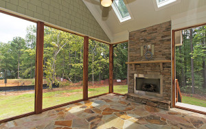 Large screened porch with fireplace