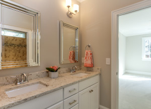 Guest Bathroom with beautiful double vanity and granite countertop