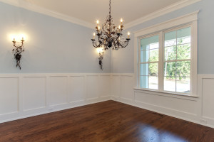 Dining Room with wainscoting and hardwood floors